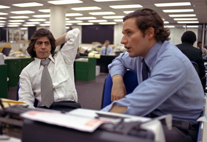 FILE - In this May 7, 1973 file photo, reporters Bob Woodward, right, and Carl Bernstein, whose reporting of the Watergate case won them a Pulitzer Prize, sit in the newsroom of the Washington Post in Washington. More than 40 years after they became the worldâs most famous journalism duo, Bob Woodward and Carl Bernstein are still making news. Bernstein was among three CNN reporters who last week broke the story of former Donald Trump lawyer Michael Cohenâs allegation that Trump had advance knowledge of the June 2016 meeting between representatives of his campaign and Russian officials. On Tuesday, July 31, 2018, Woodwardâs upcoming âFear: Inside the Trump White Houseâ was No. 1 on Amazon.com. (AP Photo, File)