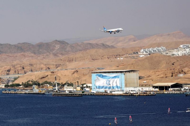 An airplane flies over Eilat, Israel, June 13, 2018. Picture taken June 13, 2018. REUTERS/Amir Cohen