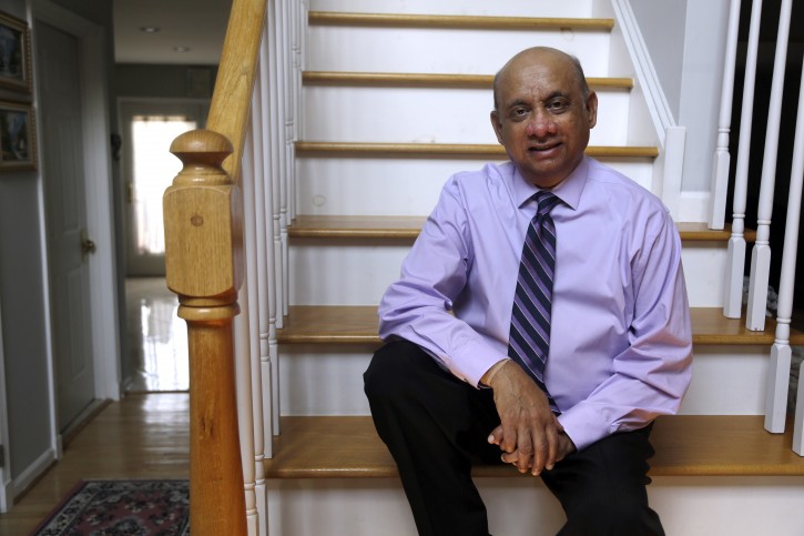 Kiran Shelat, a 65-year-old retired civil engineer, poses for a portrait in his home, Monday Aug. 6, 2018, in Yardley, Pa. Shebat had spent two years on a kidney transplant waiting list before signing up for a bold experiment with 19 others in which they received organs infected with hepatitis C. A study finds U.S. patients who accepted kidneys infected with hepatitis C were later cured. Results were published Monday in the journal Annals of Internal Medicine.   (AP Photo/Jacqueline Larma)