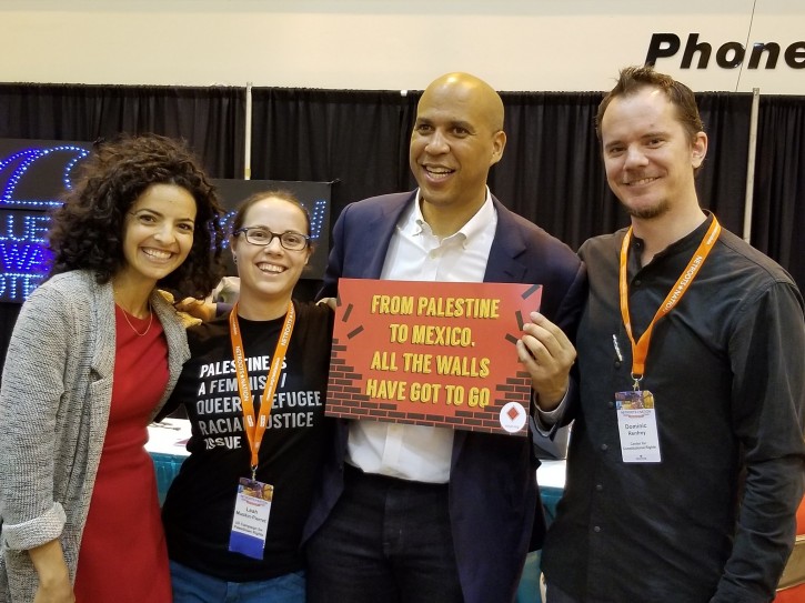 Sen. Cory Booker is shown posing with attendees at the Netroots Nation 20018 conference in New Orleans, August 2018. (@US_Campaign/Twitter)