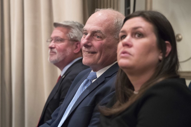 Communications Chief Bill Shine, left, Chief of Staff John Kelly, center, White House Press Secretary Sarah Huckabee Sanders listen as  President Donald Trump speaks during a news conference, Wednesday, Sept. 26, 2018, in New York. (AP Photo/Mary Altaffer)