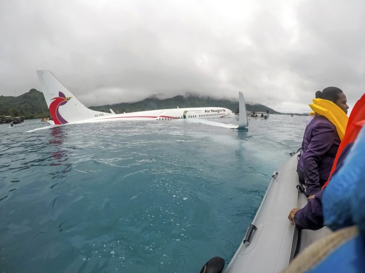 180928-N-WR252-001 CHUUK, Federated States of Micronesia (Sept. 28, 2018) U.S. Navy Sailors from Underwater Construction Team (UCT) 2 assist local authorities in shuttling the passengers and crew of Air Niugini flight PX56 to shore following the plane crashing into the sea on its approach to Chuuk International Airport in the Federated States of Micronesia. (U.S. Navy photo by Lt. Zach Niezgodski /released)