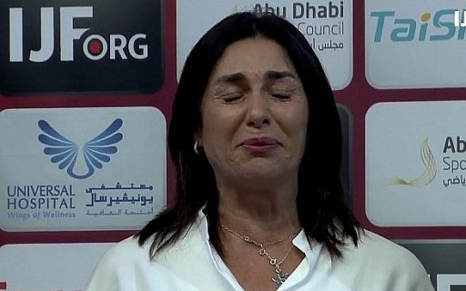 Screen capture from video of Culture and Sports Minister Miri Regev as the Israeli national anthem plays following a gold medal win at an international judo competition in Abu Dhabi, October 28, 2018. (International Judo Federation)