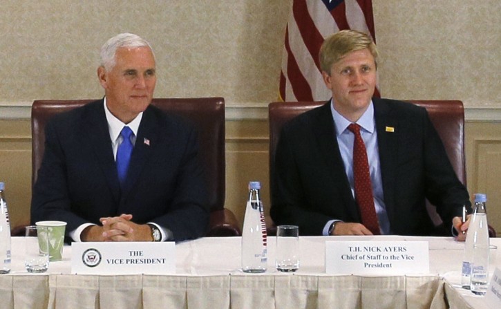 U.S. Vice President Mike Pence, center, attends a meeting with Georgia opposition leaders in Tbilisi, Georgia, Tuesday, Aug. 1, 2017. Chief of Staff to the Vice President Nick Ayers is in the center right, and United States Ambassador to Georgia Ian Kelly, center left. (Zurab Kurtsikidze/Pool Photo via AP)