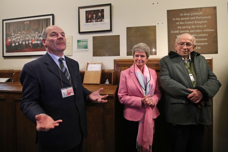 Paul Willer (right), a Jewish refugee who escaped Germany in 1939, meets Jo Roundell Greene (centre), the granddaughter of former prime minister Clement Attlee, Earl Attlee (left) the grandson of Clement Attlee in the Houses of Parliament in Westminster, London, on the 80th anniversary of the Kindertransport scheme. (Photo by Yui Mok/PA Images via Getty Images)