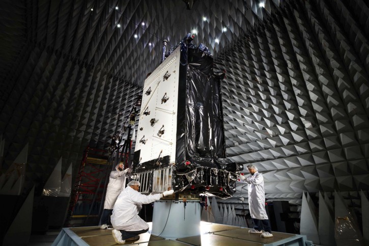 This March 22, 2016, photo provided by Lockheed Martin shows the first GPS III satellite inside the anechoic test facility at Lockheed Martin's complex south of Denver. The facility is used to ensure the signals from the satellite's components and payload will not interfere with each other. The satellite is scheduled to be launched from Cape Canaveral, Fla., on Tuesday, Dec. 18, 2018. (Pat Corkery/Lockheed Martin via AP)