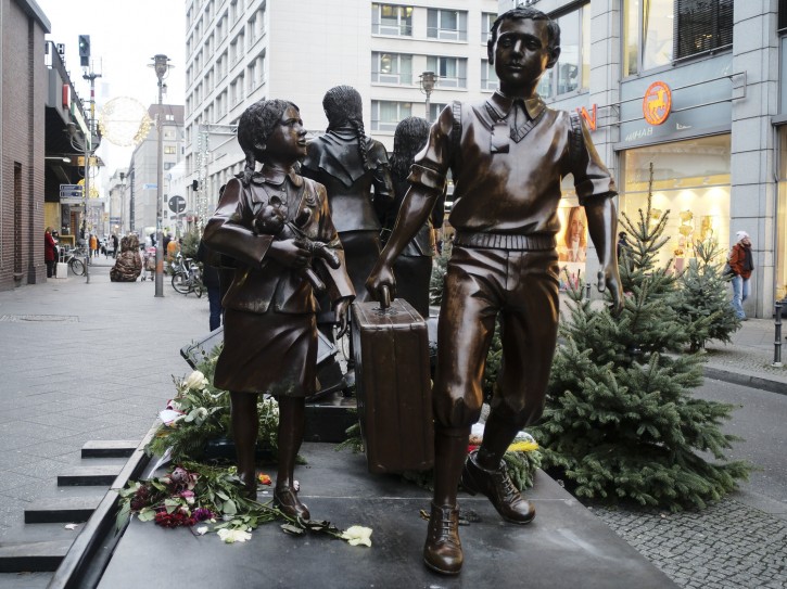 Kindertransport survivors, commemorated by a statue in Berlin, Germany. AP