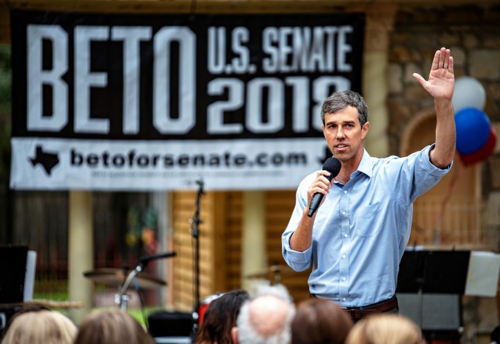 FILE PHOTO:  Representative Beto O'Rourke greets supporters before an event in Del Rio, Texas, U.S. September 22, 2018. Picture taken September 22, 2018. REUTERS/Sergio Flores/File Photo