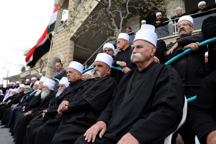 Druze people take part in a rally over U.S. President Donald Trump's support for Israeli sovereignty over the Golan Heights, in Majdal Shams near the ceasefire line between Israel and Syria in the Israeli occupied Golan Heights March 23, 2019 REUTERS/Ammar Awad