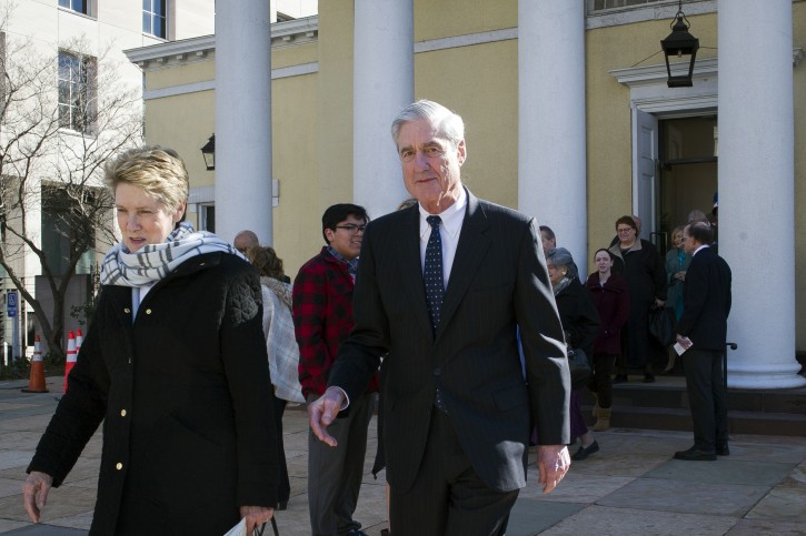Special Counsel Robert Mueller, and his wife Ann, leave St. John's Episcopal Church, across from the White House, after attending morning services, in Washington, Sunday, March 24, 2019. Mueller closed his long and contentious Russia investigation with no new charges, ending the probe that has cast a dark shadow over Donald Trump's presidency. (AP Photo/Cliff Owen)