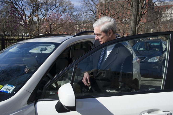 Special Counsel Robert Mueller enters his car after attending services, with his wife, at St. John's Episcopal Church, across from the White House, in Washington, Sunday, March 24, 2019. Mueller closed his long and contentious Russia investigation with no new charges, ending the probe that has cast a dark shadow over Donald Trump's presidency. (AP Photo/Cliff Owen)
