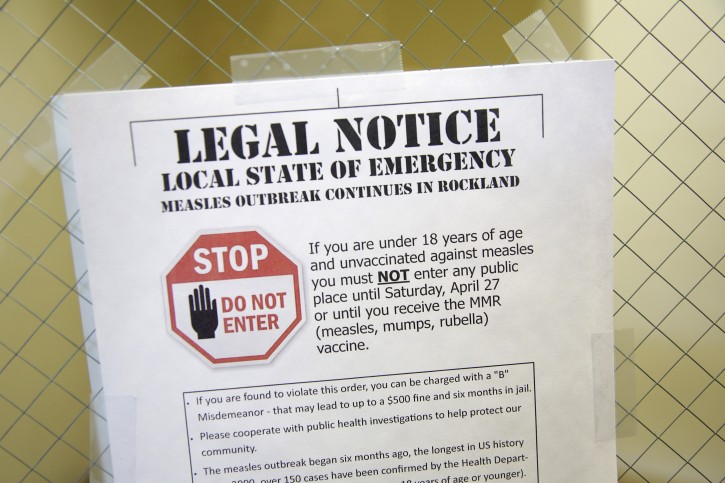 A sign explaining the local state of emergency is displayed at the Rockland County Health Department in Pomona, N.Y., Wednesday, March 27, 2019. AP