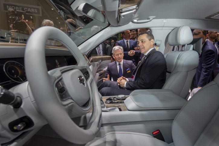 Swiss Foreign Minister Ignazio Cassis sits in a Aurus Senat car during the opening of the 89th Geneva International Motor Show, in Geneva, Switzerland, 07 March 2019. EPA