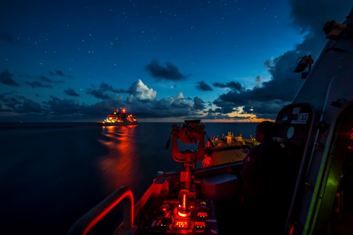 The littoral combat ship USS Fort Worth (LCS 3) prepares to transit alongside the Military Sealift Command dry cargo and ammunition ship USNS Wally Schirra (T-AKE 8) during a replenishment-at-sea during routine patrols in international waters of the South China Sea near the Spratly Islands May 9, 2015. U.S. Navy photo by Mass Communication Specialist 2nd Class Conor Minto/Handout via REUTERS