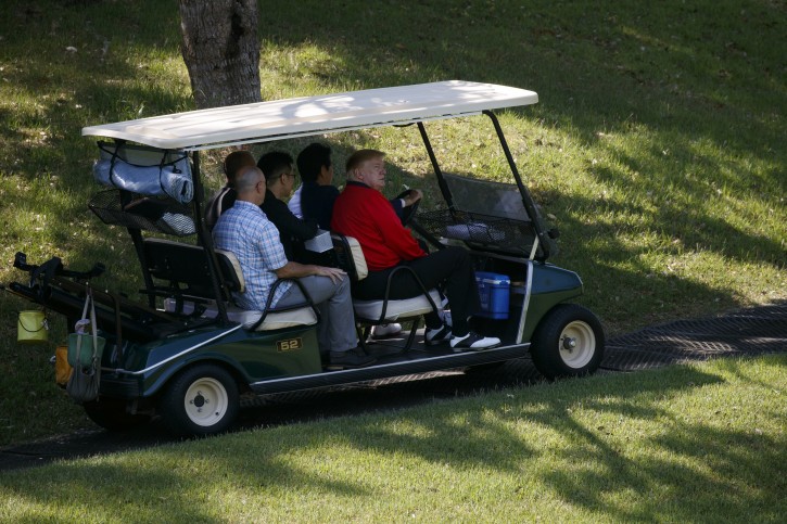 President Donald Trump rides in a golf cart with Japanese Prime Minister Shinzo Abe before playing a round of golf at Mobara Country Club, Sunday, May 26, 2019, in Chiba, Japan. (AP Photo/Evan Vucci)