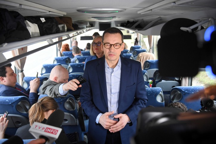 Polish Prime Minister Mateusz Morawiecki speaks to journalists on a bus before leaving Warsaw, Poland 18 February 2019. EPA