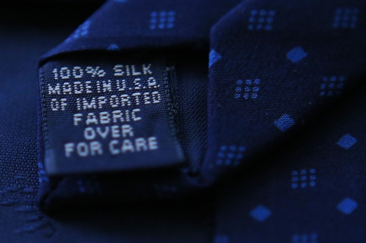 FILE PHOTO: A "Made in USA" label is pictured on the back of a tie Medford, Massachusetts January 29, 2014. REUTERS/Brian Snyder/File Photo