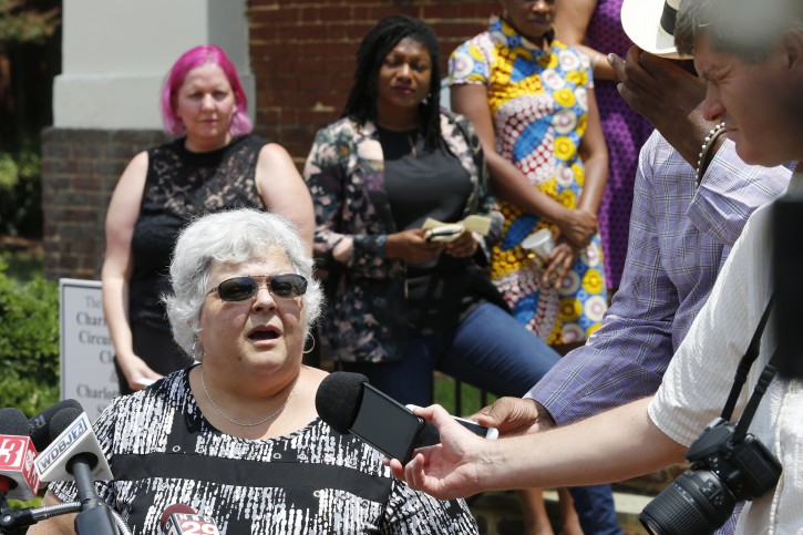 Susan Bro, mother of Heather Heyer, who was killed during the Unite the Right rally in 2017, speaks to reporters after the sentencing of James Alex Fields Jr., at General District Court in Charlottesville, Va., Monday, July 15, 2019. Fields was sentenced to life plus 419 years for his role in the 2017 Night The Right rally. (AP Photo/Steve Helber)