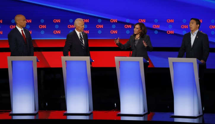 From left, Sen. Cory Booker, D-N.J., former Vice President Joe Biden, Sen. Kamala Harris, D-Calif., and Andrew Yang participate in the second of two Democratic presidential primary debates hosted by CNN Wednesday, July 31, 2019, in the Fox Theatre in Detroit. (AP Photo/Paul Sancya)