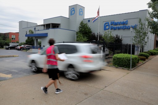 FILE - In this June 21, 2019, file photo, a motorist enters Planned Parenthood of the St. Louis Region and Southwest Missouri. Critics of new abortion restrictions in Missouri are headed to court to try to block the law from taking effect. Attorneys for Planned Parenthood will argue Monday, Aug. 26, 2019, that the law should be temporarily blocked until the lawsuit is decided. (Christian Gooden/St. Louis Post-Dispatch via AP, File)